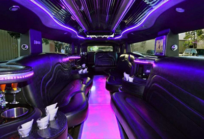 interior neon light in a party bus and a limo bus