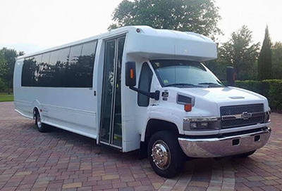 elegant white limo bus from our limo services