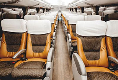 comfortable seating on a charter bus and a coach bus rental